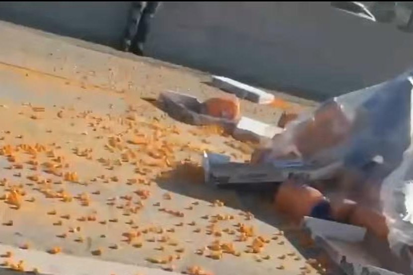 105 Freeway cheese ball spill scatters about 120 tubs in Lynwood