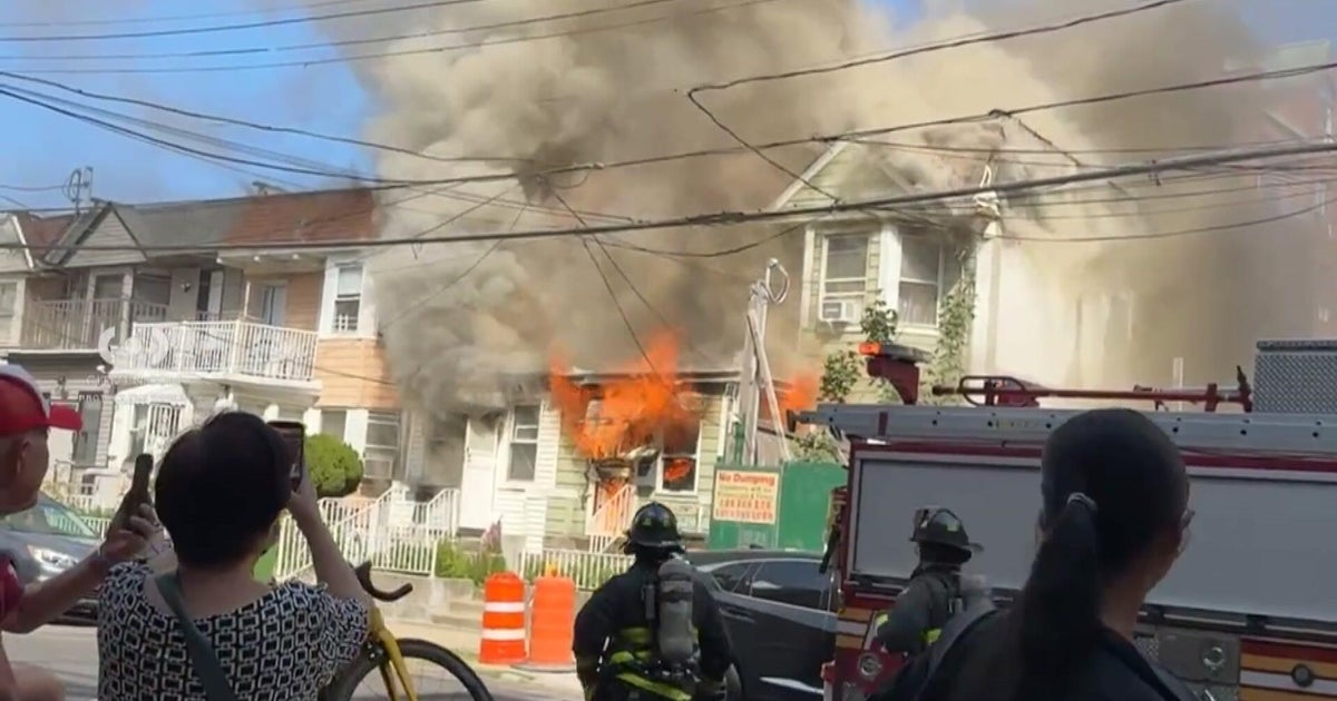 Flushing Queens fire injures at least 12 as flames spread to nearby buildings