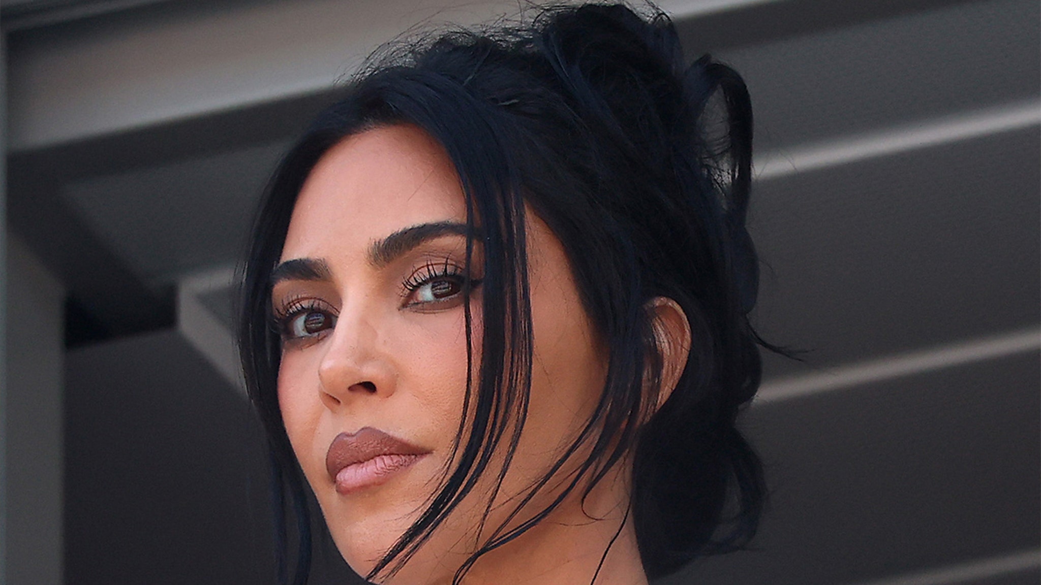 Kim Kardashian says party photos were scheduled before MJ’s death
